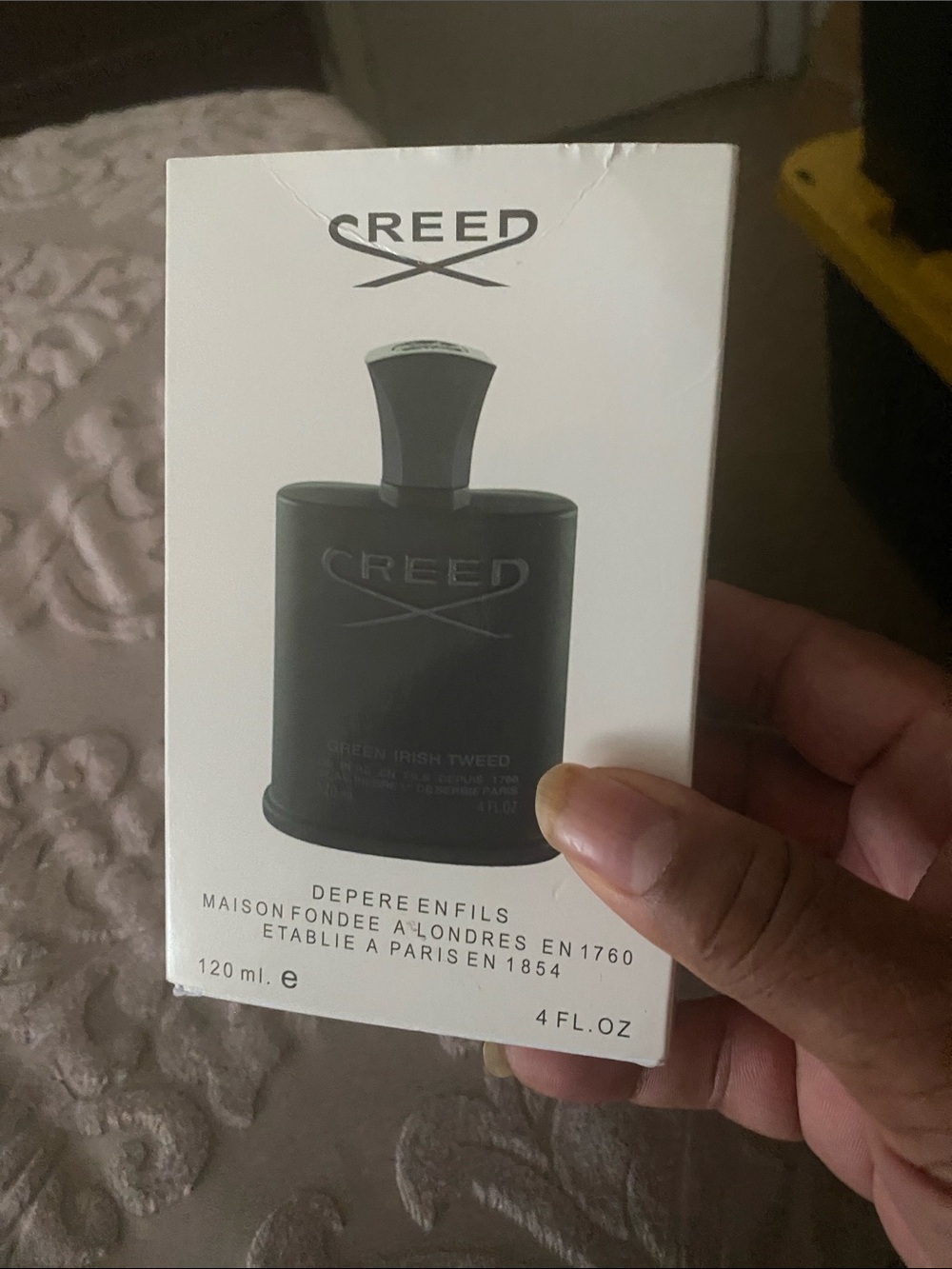 Creed White Box with Black Bottle Image